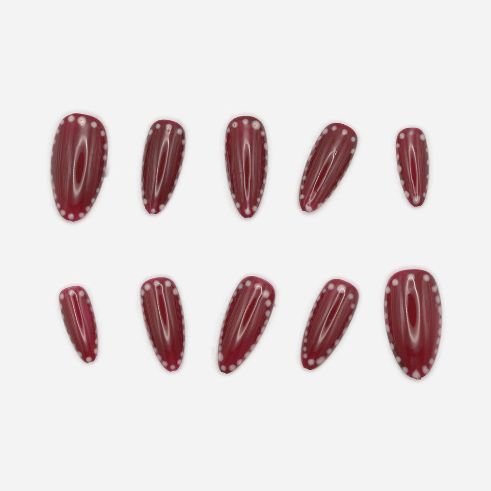 Burgundy Dots ten-nail set with glossy wine-burgundy polish and small white dotted borders