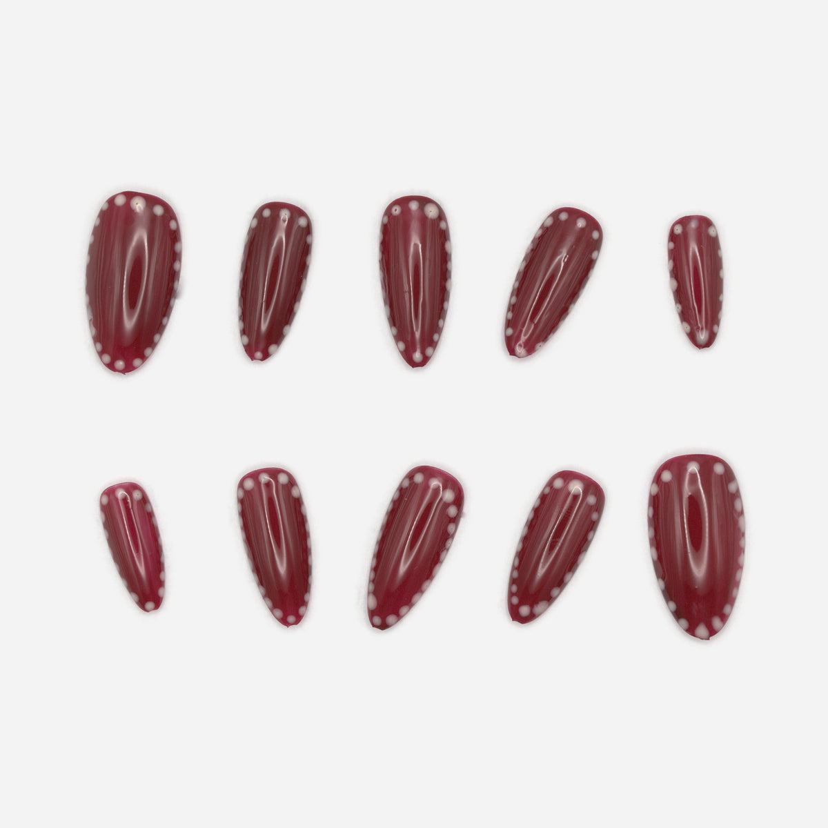 Burgundy Dots ten-nail set with glossy wine-burgundy polish and small white dotted borders